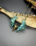 Golden Moose Skull Pendant Necklace – Brass with Green Patina Horns Front