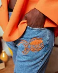 Skinny-Fit-Mid-Blue-Jeans-With-Vertical-Bead-Work-Model